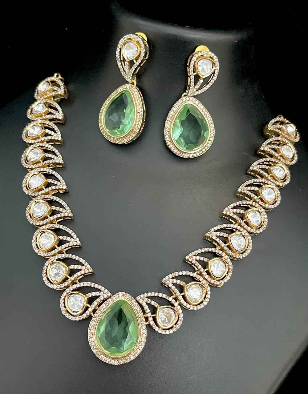 A premium quality celebrity look mozonite. Stonework necklace with beautiful earrings