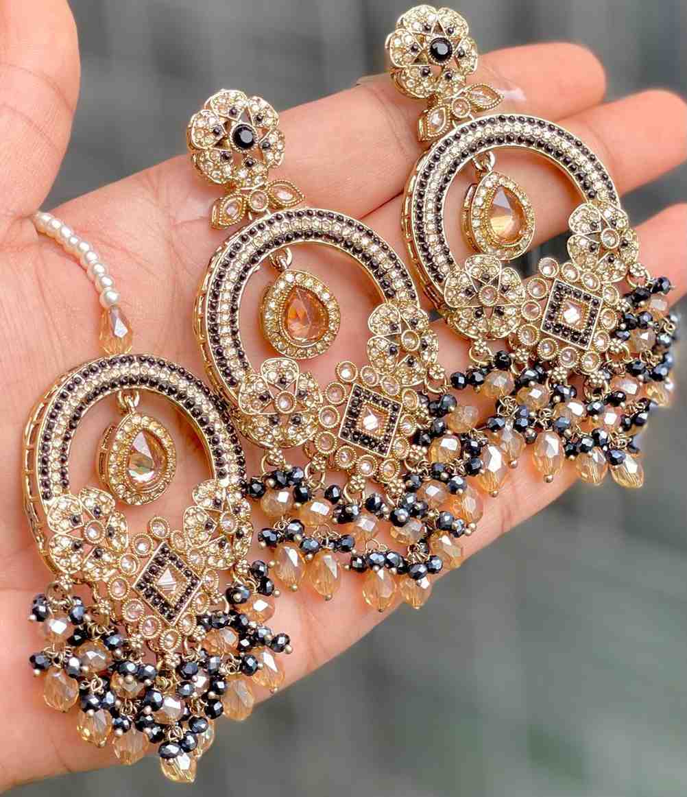 Reverse Ad Earrings And Tika