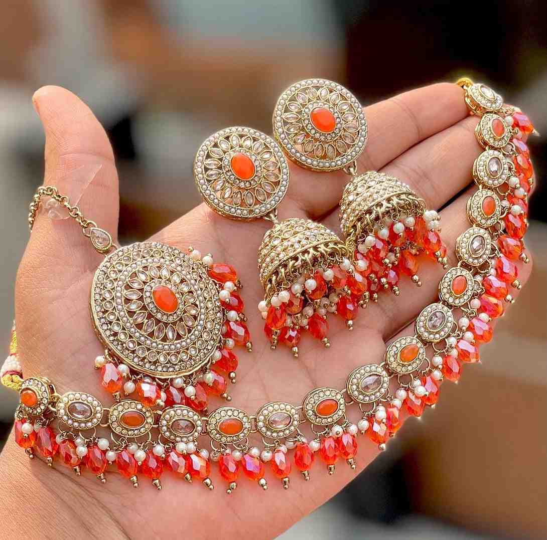 Reverse Ad Chokker With Beautiful Jhumka And Tika